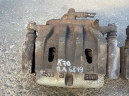 Суппорт тормозной Toyota Camry 70 XV70 2018-2024 Перед. 